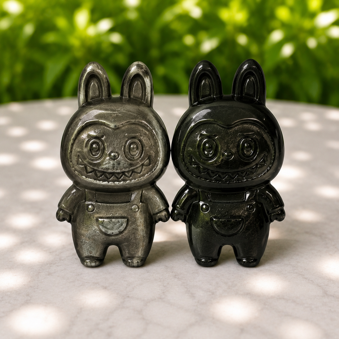 Labuba Silver Obsidian Crystal Carving