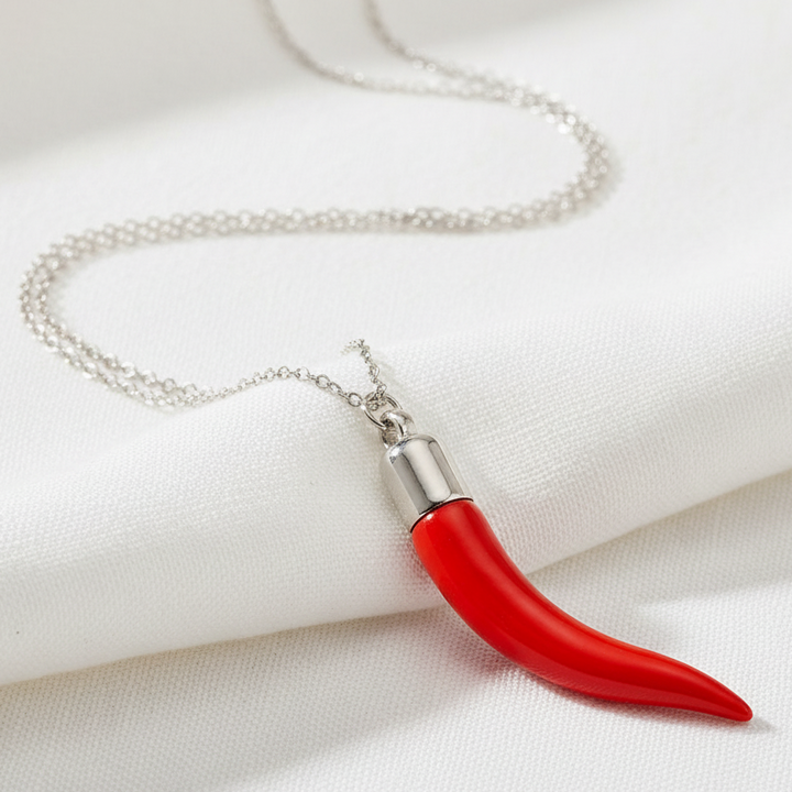 Necklace on white linen