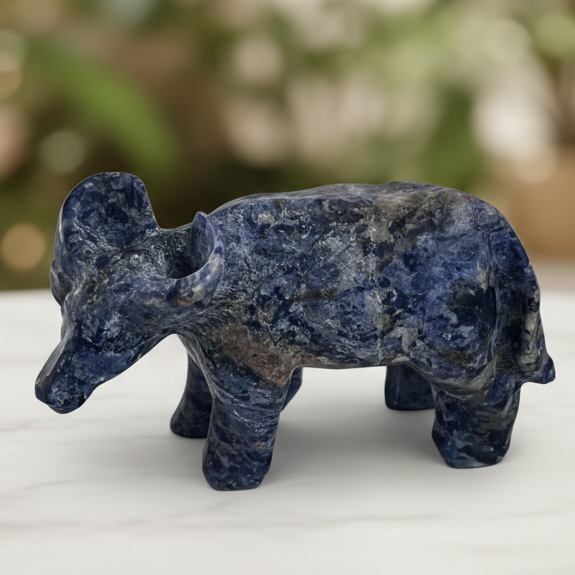 Sodalite hippo with marble bokeh background
